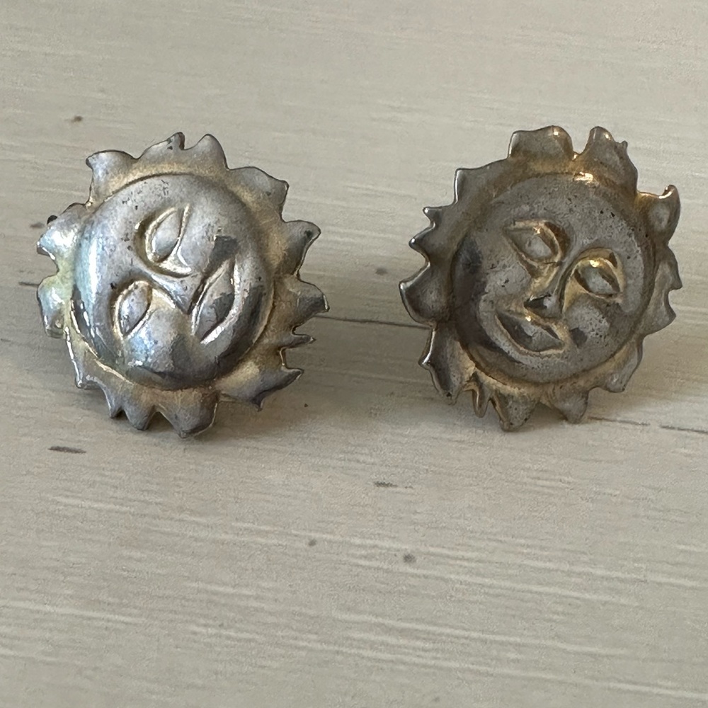 Direction One vintage sun face clip earrings